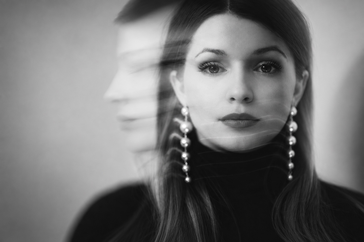 Black-and-white female portrait with a double-exposure motion effect, by Cristian Muntean