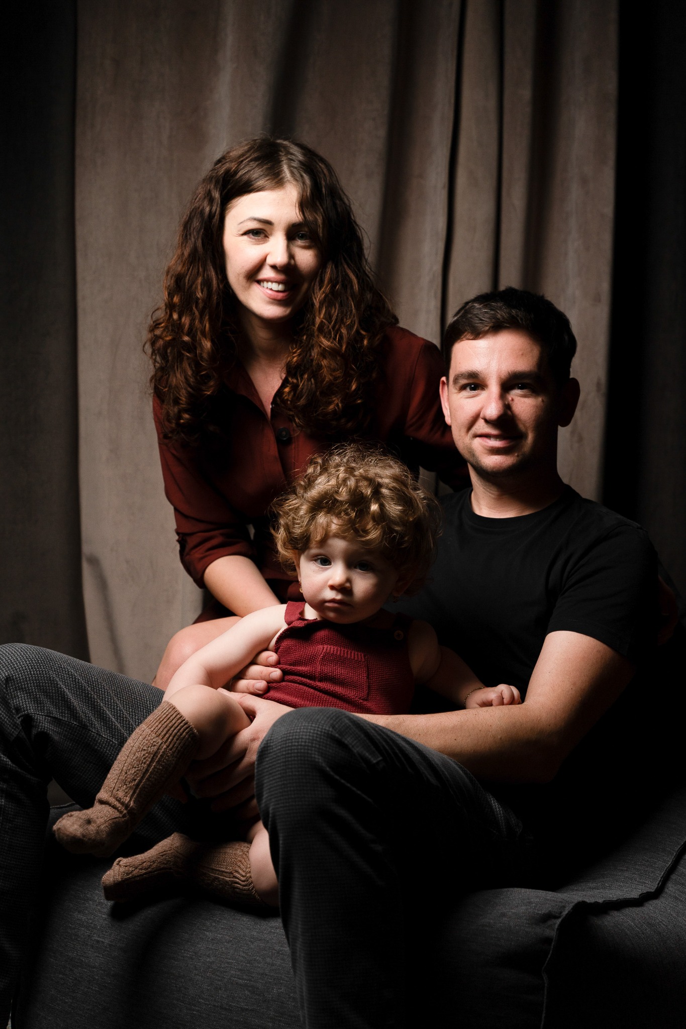 Family portrait of parents with their child
