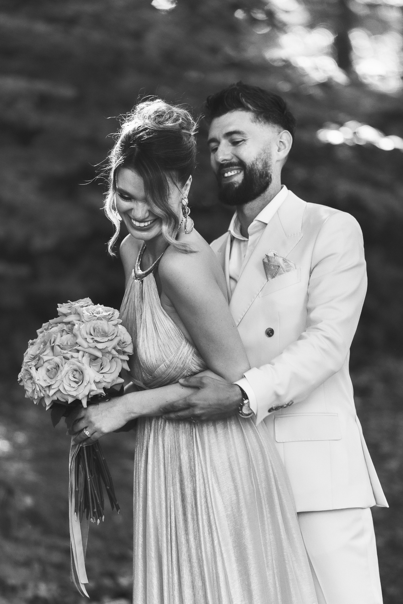 Black-and-white portrait of a smiling couple